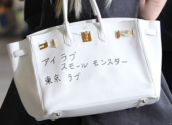 Guess Who is Carrying a White Hermes Bag with Japanese Writing ...