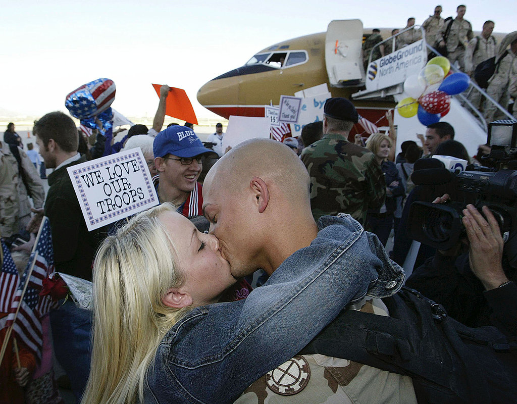 US Army soldier Ben Chane kisses his wife, Windy, upon returning in 2004 with other members of the Utah National Guard after a 14-month tour of duty in Iraq.
US Army soldier Ben Chane kisses his wife, Windy, upon returning in 2004 with other members of the Utah National Guard after a 14-month tour of duty in Iraq.