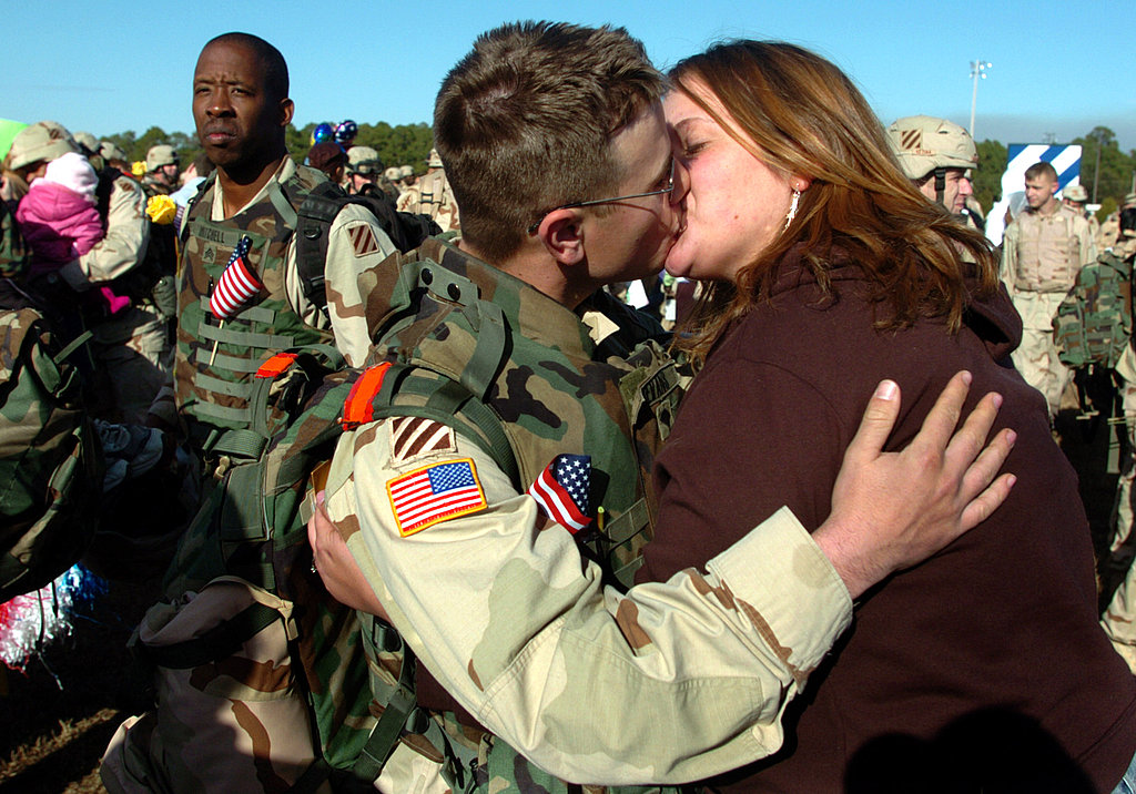 Meghan Gibson greets her fiancé, Spc. Aaron Evans, in 2006.
Meghan Gibson greets her fiancé, Spc. Aaron Evans, in 2006.