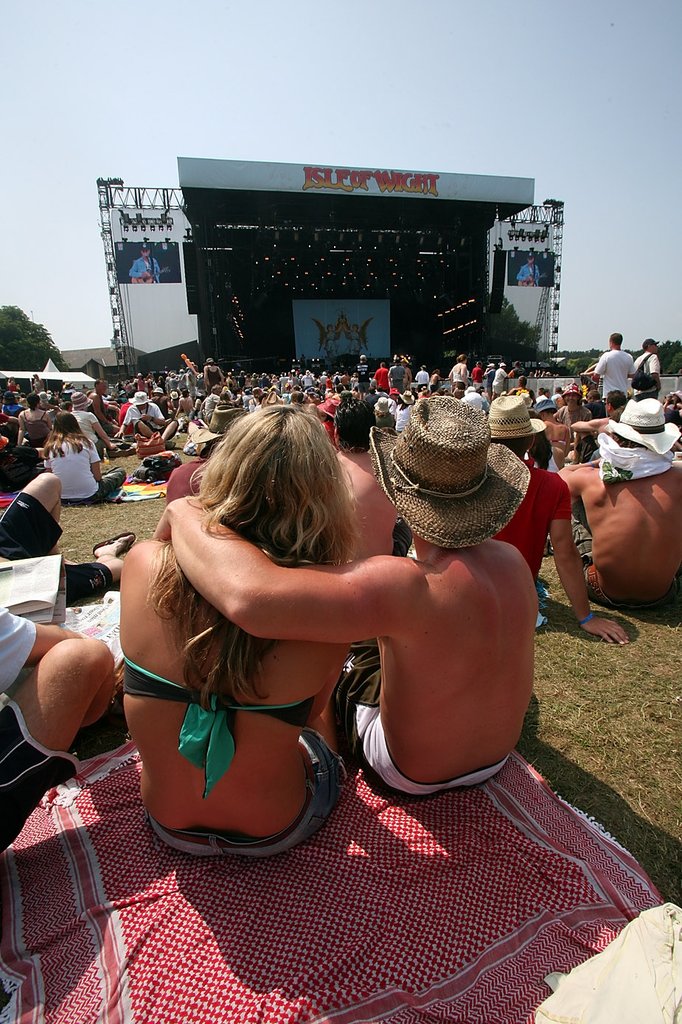Two people watched a concert at the Wight Festival in the Isle of Wight, England.
Two people watched a concert at the Wight Festival in the Isle of Wight, England.