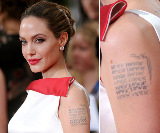 Angelina Jolie has the geographical coordinates of each of her six children's birth places on her left arm. The last coordinate is the latitude and longitude of Shawnee, OK, where her husband Brad Pitt was born. The ink covers a former dragon tattoo and her ex's name, Billy Bob.
Angelina Jolie has the geographical coordinates of each of her six children's birth places on her left arm. The last coordinate is the latitude and longitude of Shawnee, OK, where her husband Brad Pitt was born. The ink covers a former dragon tattoo and her ex's name, Billy Bob.
