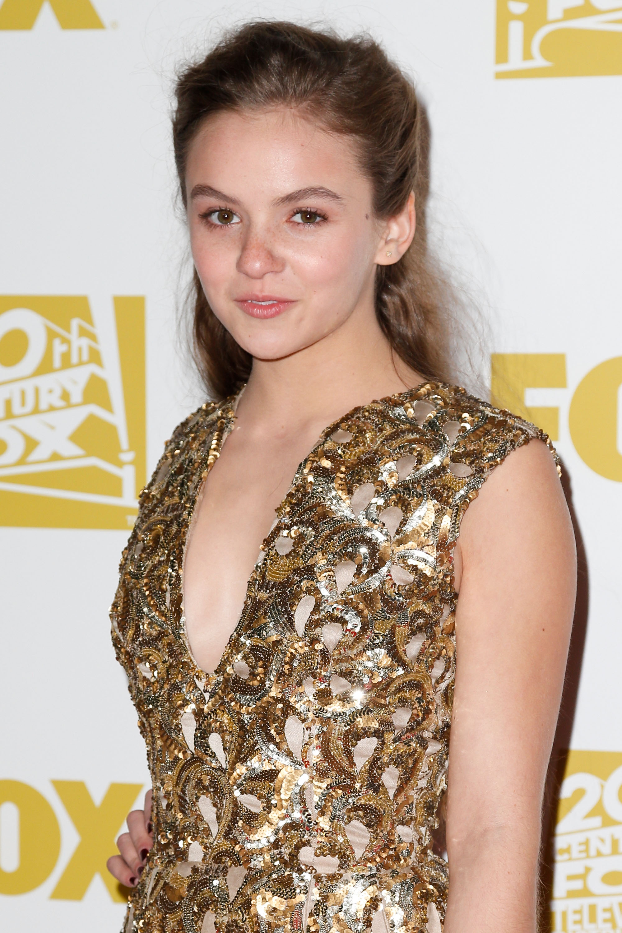 Morgan Saylor dressed in gold at the Fox Golden Globes after party