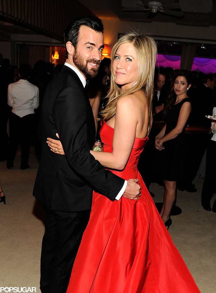 Justin Theroux and Jennifer Aniston cuddled up inside the Vanity Fair Oscar party on Sunday night after the award show.
Justin Theroux and Jennifer Aniston cuddled up inside the Vanity Fair Oscar party on Sunday night after the award show.