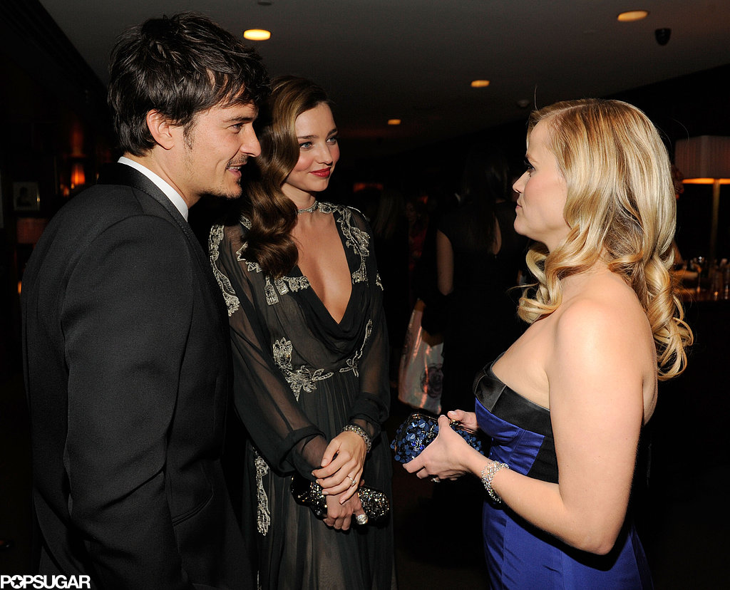 Reese Witherspoon chatted inside the Vanity Fair Oscar party with Miranda Kerr and Orlando Bloom.
Reese Witherspoon chatted inside the Vanity Fair Oscar party with Miranda Kerr and Orlando Bloom.