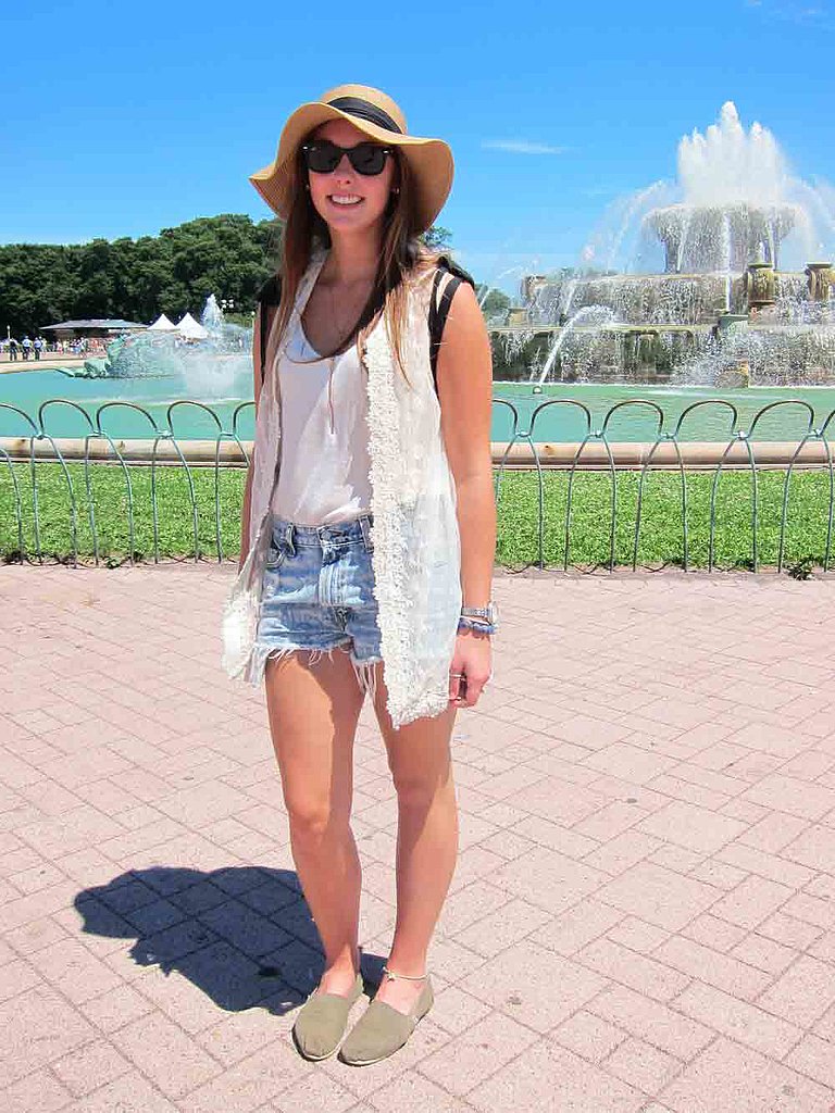 Fashion can be comfortable, as Alice proved with her loose white tank and sheer lace-lined vest. Her olive-green TOMS and Uniqlo hat — essential on an SPF-70 kind of day — were our favorite accessories.
Fashion can be comfortable, as Alice proved with her loose white tank and sheer lace-lined vest. Her olive-green TOMS and Uniqlo hat — essential on an SPF-70 kind of day — were our favorite accessories.
