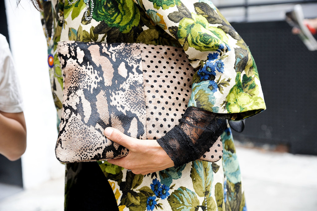 We love a little print juxtaposition, like florals and an exotic clutch.
We love a little print juxtaposition, like florals and an exotic clutch.