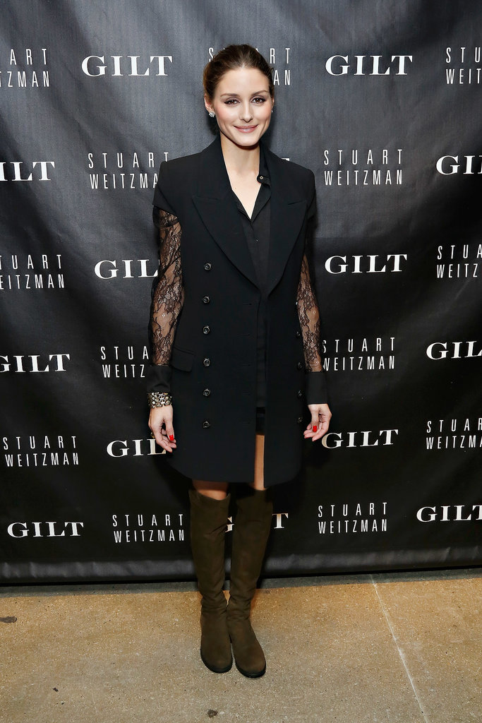 Olivia outfitted a chic sleeveless coat with knee-high Stuart Weitzman boots at the anniversary celebration for the 5050 Boot in October.
Olivia outfitted a chic sleeveless coat with knee-high Stuart Weitzman boots at the anniversary celebration for the 5050 Boot in October.
