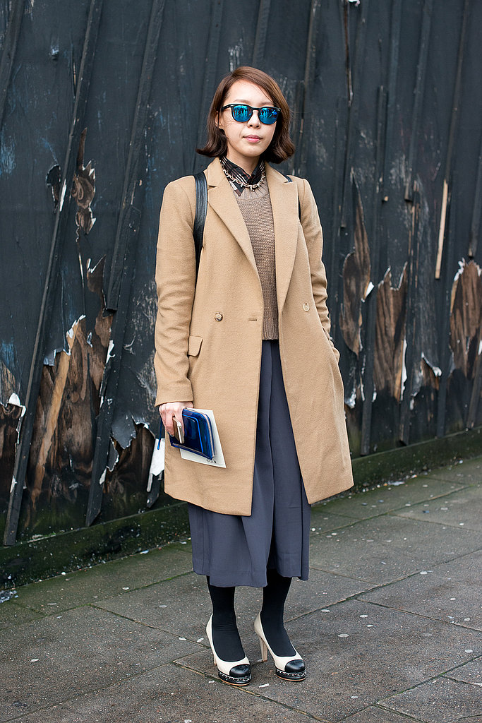 Who knew how well a classic camel coat paired with brilliant, mirrored shades?
Who knew how well a classic camel coat paired with brilliant, mirrored shades?