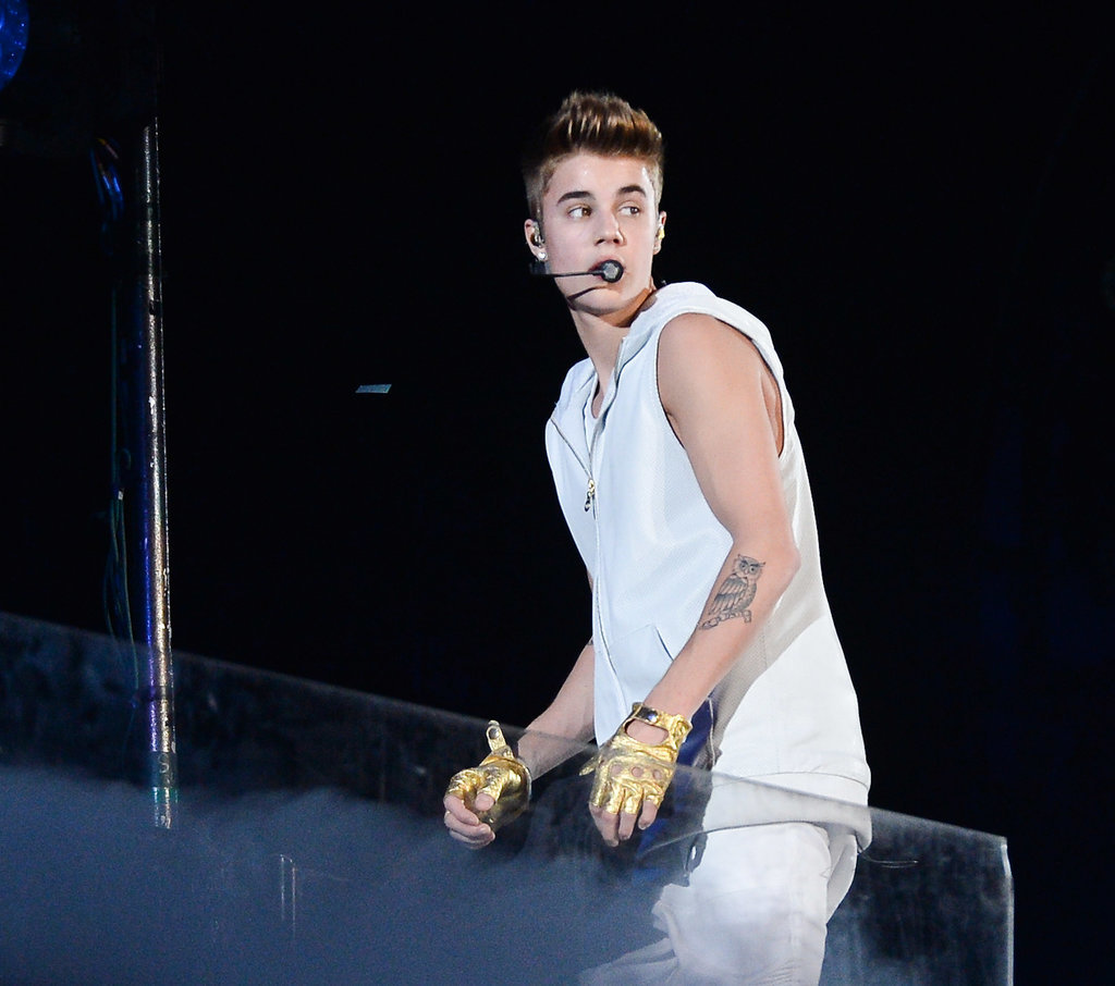Source: Getty/George Pimentel
July 25, 2013
The pop singer caused Internet outrage when he was photographed while allegedly spitting on fans outside his hotel in Toronto. However, Justin's rep later clarified that he was not spitting on fans but did not explain who or what he was spitting on.
Oct. 12, 2013
Justin was in hot water yet again when DJ Michael Woods's tour manager, Alex Madden, accused the teen of assaulting him during Michael's set in Seoul. The DJ tweeted, "Story is Justin and his army of heavy security muscled in to the DJ booth half-way through my set in South Korea, demanding hip hop. So when I told Justin to f*ck off and put some clothes on, he took a cheap shot at my tour manager and fled behind his wall of security." He later added, "Dear Justin, would you please grow the f*ck up already? In the meantime, put a shirt on and stay away from nightclubs."
Nov. 2, 2013
Things got icky for Justin during a tour stop in Brazil when he was photographed while allegedly leaving a brothel in Rio. The snaps showed Justin wrapped up in a sheet with his telltale tattoos poking out from underneath.
Source: Getty/George Pimentel
July 25, 2013
The pop singer caused Internet outrage when he was photographed while allegedly spitting on fans outside his hotel in Toronto. However, Justin's rep later clarified that he was not spitting on fans but did not explain who or what he was spitting on.
Oct. 12, 2013
Justin was in hot water yet again when DJ Michael Woods's tour manager, Alex Madden, accused the teen of assaulting him during Michael's set in Seoul. The DJ tweeted, "Story is Justin and his army of heavy security muscled in to the DJ booth half-way through my set in South Korea, demanding hip hop. So when I told Justin to f*ck off and put some clothes on, he took a cheap shot at my tour manager and fled behind his wall of security." He later added, "Dear Justin, would you please grow the f*ck up already? In the meantime, put a shirt on and stay away from nightclubs."
Nov. 2, 2013
Things got icky for Justin during a tour stop in Brazil when he was photographed while allegedly leaving a brothel in Rio. The snaps showed Justin wrapped up in a sheet with his telltale tattoos poking out from underneath.