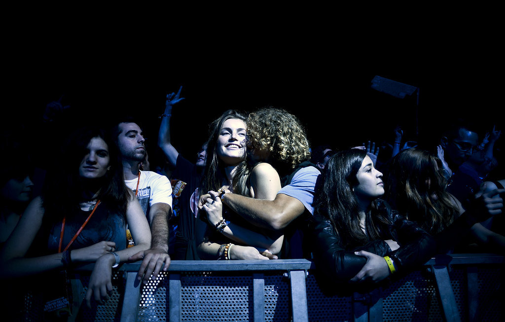 A couple kissed at a music festival in Portugal.
A couple kissed at a music festival in Portugal.