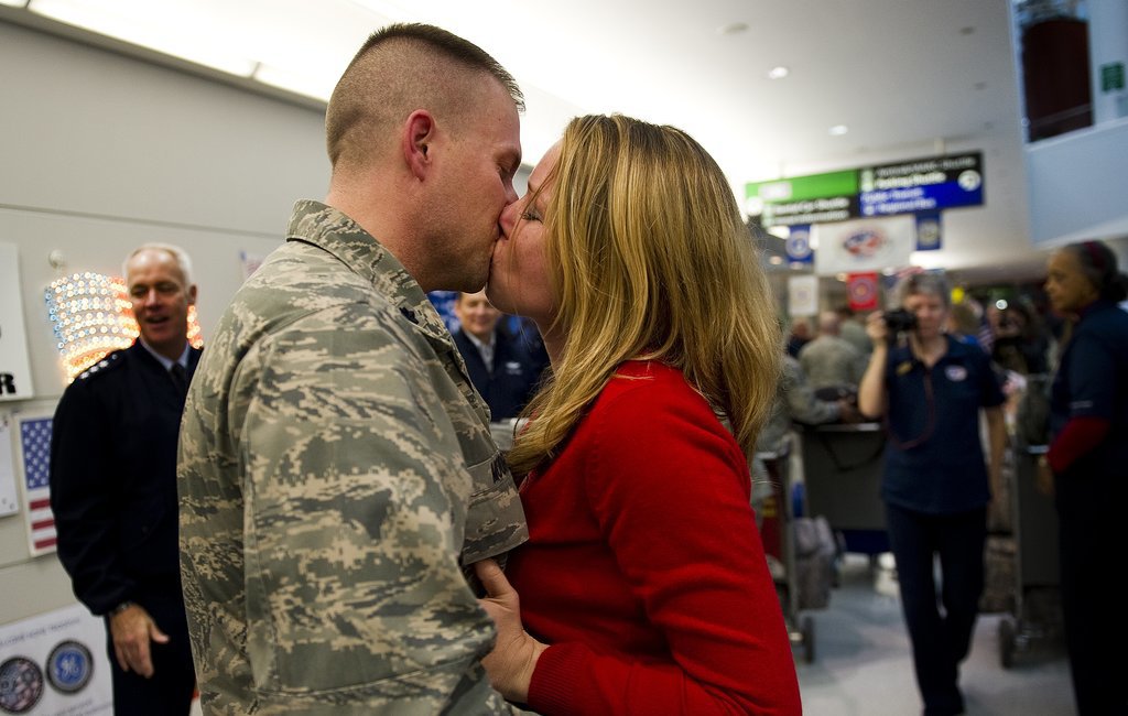 Major Steve Moore kissed his wife, Emily, when he arrived home at Baltimore Washington International Airport in Baltimore on Dec. 20, 2011. He was one of more than 300 Airmen, the last Air Force personnel to return home from Iraq.
Major Steve Moore kissed his wife, Emily, when he arrived home at Baltimore Washington International Airport in Baltimore on Dec. 20, 2011. He was one of more than 300 Airmen, the last Air Force personnel to return home from Iraq.