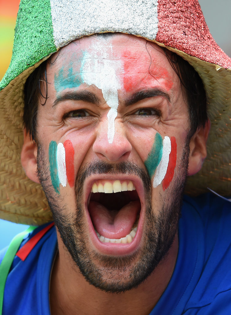An Italy fan painted his face to get in the spirit.
An Italy fan painted his face to get in the spirit.