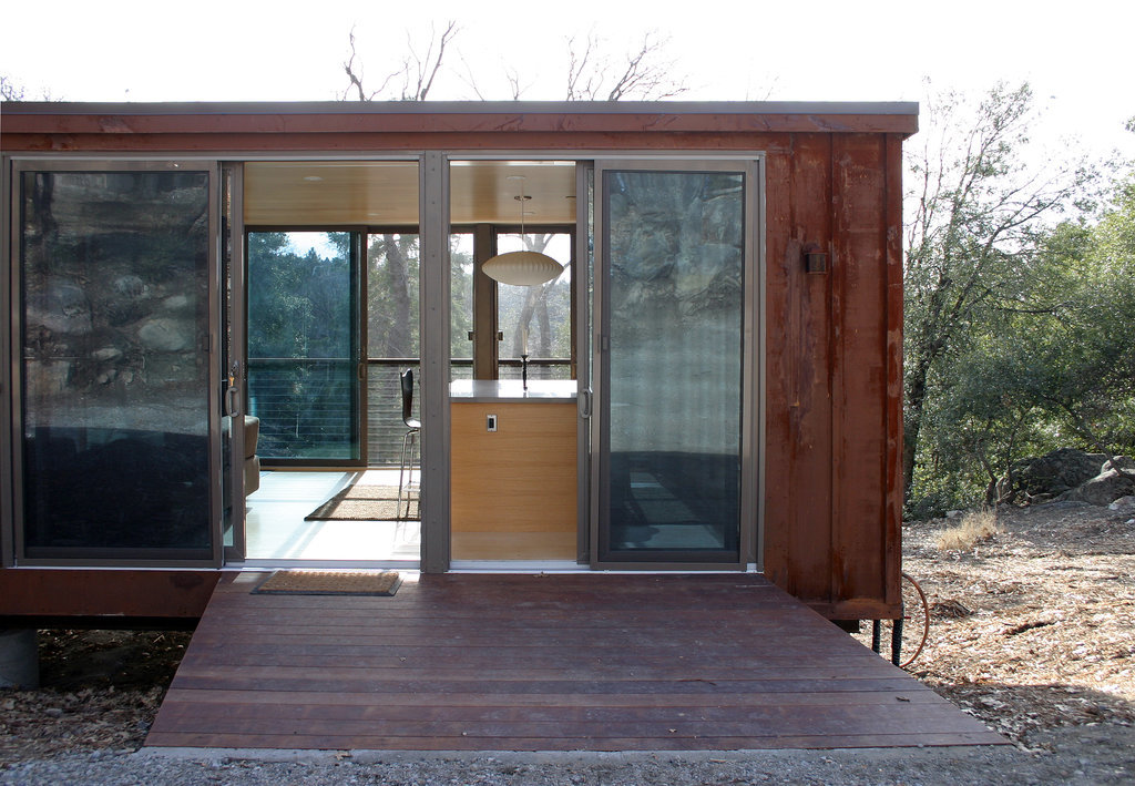 Located in San Diego, the Palomar Mountain weeHouse is a gorgeous example of tiny housing done right. The small space uses windows to create a feeling of openness and features a wooden deck as an outdoor extension of the home.
Located in San Diego, the Palomar Mountain weeHouse is a gorgeous example of tiny housing done right. The small space uses windows to create a feeling of openness and features a wooden deck as an outdoor extension of the home.