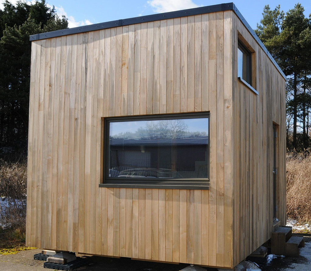 Designed with couples in mind, The Cube has everything that a family of two could want. Ample storage space and seating, a full kitchen and bathroom, a lounge, and a washing machine make up the long list of amenities included in this tiny home. The best part, however, is its low environmental impact. The Cube is built with sustainable materials, has a composting toilet, and uses low-energy electronics to ensure a carbon footprint even smaller than the house itself.
Designed with couples in mind, The Cube has everything that a family of two could want. Ample storage space and seating, a full kitchen and bathroom, a lounge, and a washing machine make up the long list of amenities included in this tiny home. The best part, however, is its low environmental impact. The Cube is built with sustainable materials, has a composting toilet, and uses low-energy electronics to ensure a carbon footprint even smaller than the house itself.