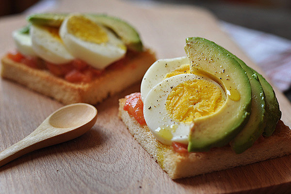 5. Egg and Avocado Breakfast Pizza
Eggs and avocado pair perfectly together for a filling breakfast that is rich in both protein and healthy fats. In fact, recent research found that eating half of an avocado at a meal may help people feel more satisfied and reduce between meal snack cravings. Plus, studies show that eating eggs for breakfast reduces hunger and decreases calorie consumption at lunch and throughout the day.
To Make: Toast a whole-grain pita round or piece of toast until slightly crisp. Top with half of a small avocado, mashed, and a squeeze of lemon juice. Then top with a sliced hard-boiled egg, salt, pepper, and a drizzle of salsa, if desired.
6. Overnight Oats These oats won't take anytime out of your morning because you make them entirely the night before! Plus, they are a twist on traditional oats since they are a cool refreshing breakfast option that you can slurp right from the jar! Oatmeal's soluble fiber can help keep cholesterol levels in check and the number on the scale down, but since this recipe also contains nonfat Greek yogurt, it packs a one-two punch. A study that followed 120,000 people over 20 years found that yogurt was the number one food that was associated with keeping weight off long-term — more than even fruits, veggies, and grains!
To Make: The night before, combine 1/3 cup old-fashion oats, 1/3 cup nonfat plain Greek yogurt, 1/3 cup skim milk, 1/2 cup berries of your choice, 2 tbsp. chopped nuts, and a drizzle of honey in a mason jar (or other tall container with a lid). Refrigerate overnight and enjoy slurping straight from the jar the next morning!
Photo: Tailor Tang
More from Self.com:
Tips From A Mudderella Trainer For Your Best Mud Run Yet!
Should "Added Sugar" Labels on Food Be Mandatory?
Drink Your Greens With These Healthy Kale Recipes
5. Egg and Avocado Breakfast Pizza
Eggs and avocado pair perfectly together for a filling breakfast that is rich in both protein and healthy fats. In fact, recent research found that eating half of an avocado at a meal may help people feel more satisfied and reduce between meal snack cravings. Plus, studies show that eating eggs for breakfast reduces hunger and decreases calorie consumption at lunch and throughout the day.
To Make: Toast a whole-grain pita round or piece of toast until slightly crisp. Top with half of a small avocado, mashed, and a squeeze of lemon juice. Then top with a sliced hard-boiled egg, salt, pepper, and a drizzle of salsa, if desired.
6. Overnight Oats These oats won't take anytime out of your morning because you make them entirely the night before! Plus, they are a twist on traditional oats since they are a cool refreshing breakfast option that you can slurp right from the jar! Oatmeal's soluble fiber can help keep cholesterol levels in check and the number on the scale down, but since this recipe also contains nonfat Greek yogurt, it packs a one-two punch. A study that followed 120,000 people over 20 years found that yogurt was the number one food that was associated with keeping weight off long-term — more than even fruits, veggies, and grains!
To Make: The night before, combine 1/3 cup old-fashion oats, 1/3 cup nonfat plain Greek yogurt, 1/3 cup skim milk, 1/2 cup berries of your choice, 2 tbsp. chopped nuts, and a drizzle of honey in a mason jar (or other tall container with a lid). Refrigerate overnight and enjoy slurping straight from the jar the next morning!
Photo: Tailor Tang
More from Self.com:
Tips From A Mudderella Trainer For Your Best Mud Run Yet!
Should "Added Sugar" Labels on Food Be Mandatory?
Drink Your Greens With These Healthy Kale Recipes