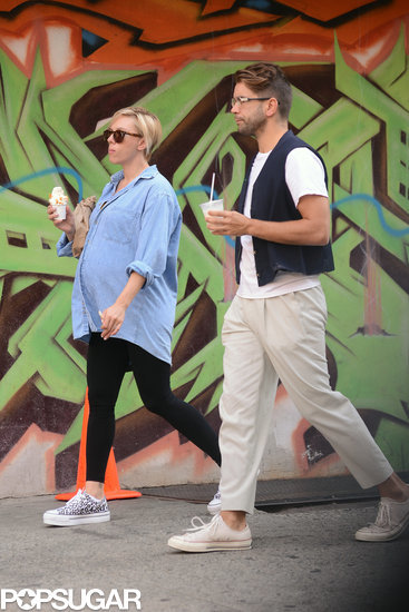 Scarlett Johansson Flaunts Her Growing Baby Bump on a Sweet Stroll Scarlett Johansson Flaunts Her Growing Baby Bump on a Sweet Stroll
