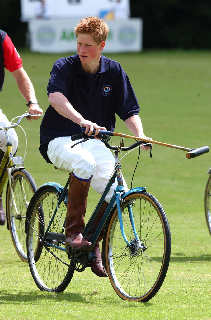 Harry played polo on a bicycle for a charity match in Wilshire, England, in 2002.
Harry played polo on a bicycle for a charity match in Wilshire, England, in 2002.