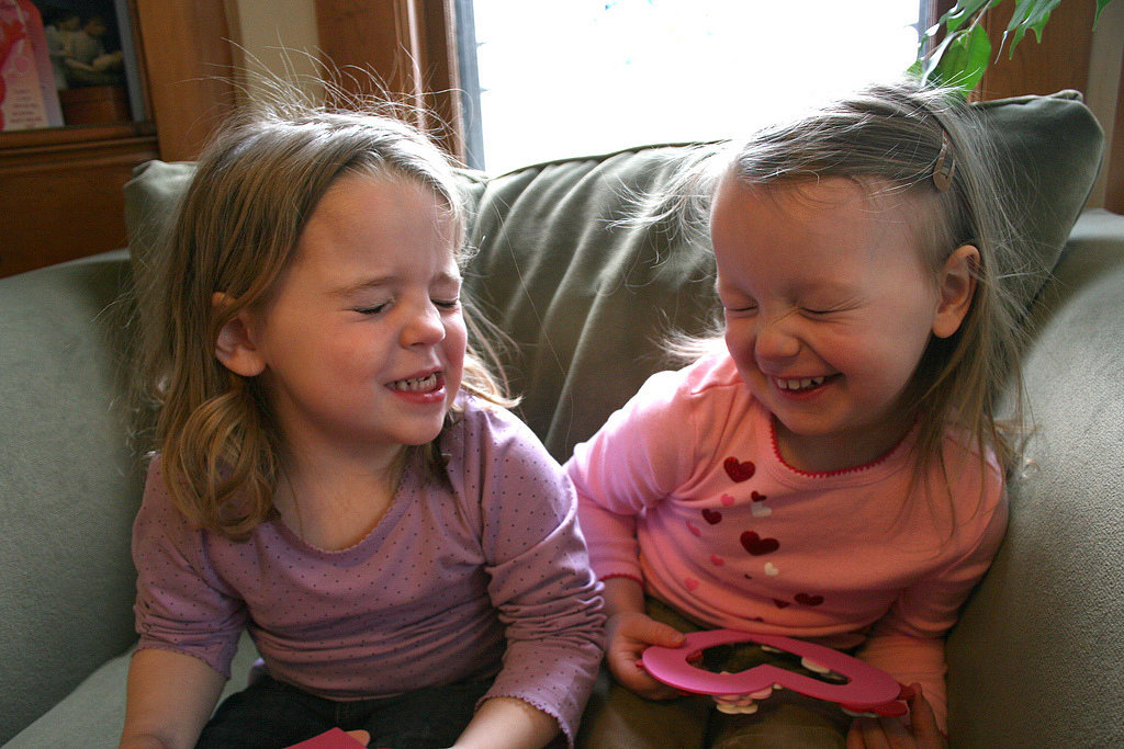 The moment one child smiles is always the same moment another one blinks.