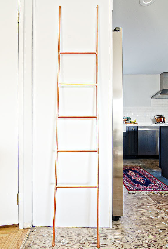 This DIY copper ladder is perfect for organizing everything from throw blankets to towels.
This DIY copper ladder is perfect for organizing everything from throw blankets to towels.