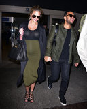 Chrissy Teigen and John Legend Coordinate Outfits For Their Airport Arrival