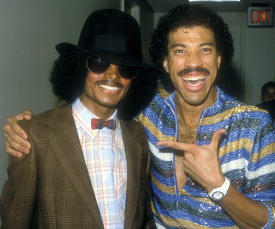Michael, who is Nicole Richie's godfather, posed with her dad, Lionel, in 1980.
Michael, who is Nicole Richie's godfather, posed with her dad, Lionel, in 1980.