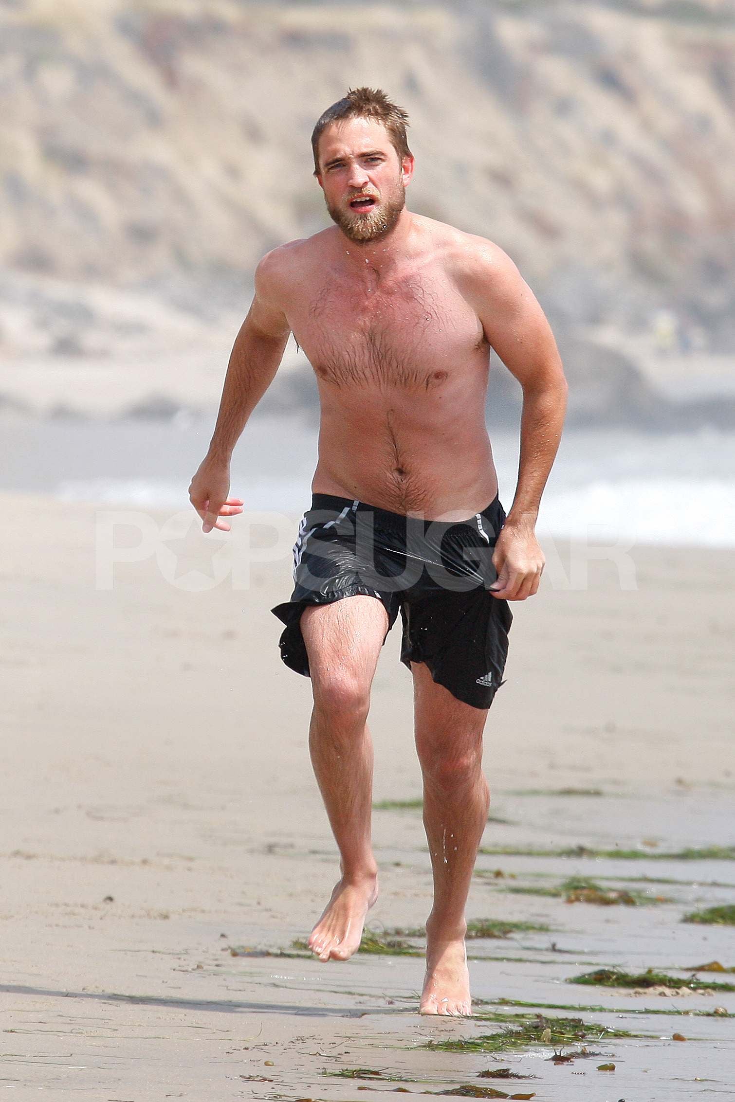 Robert Pattinson Went Running Shirtless On The Beach Shirtless Robert Pattinson Plays On The