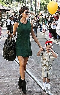 Victoria Beckham Wearing Green Suede Dress In LA Victoria Beckham Wearing Green Suede Dress In LA