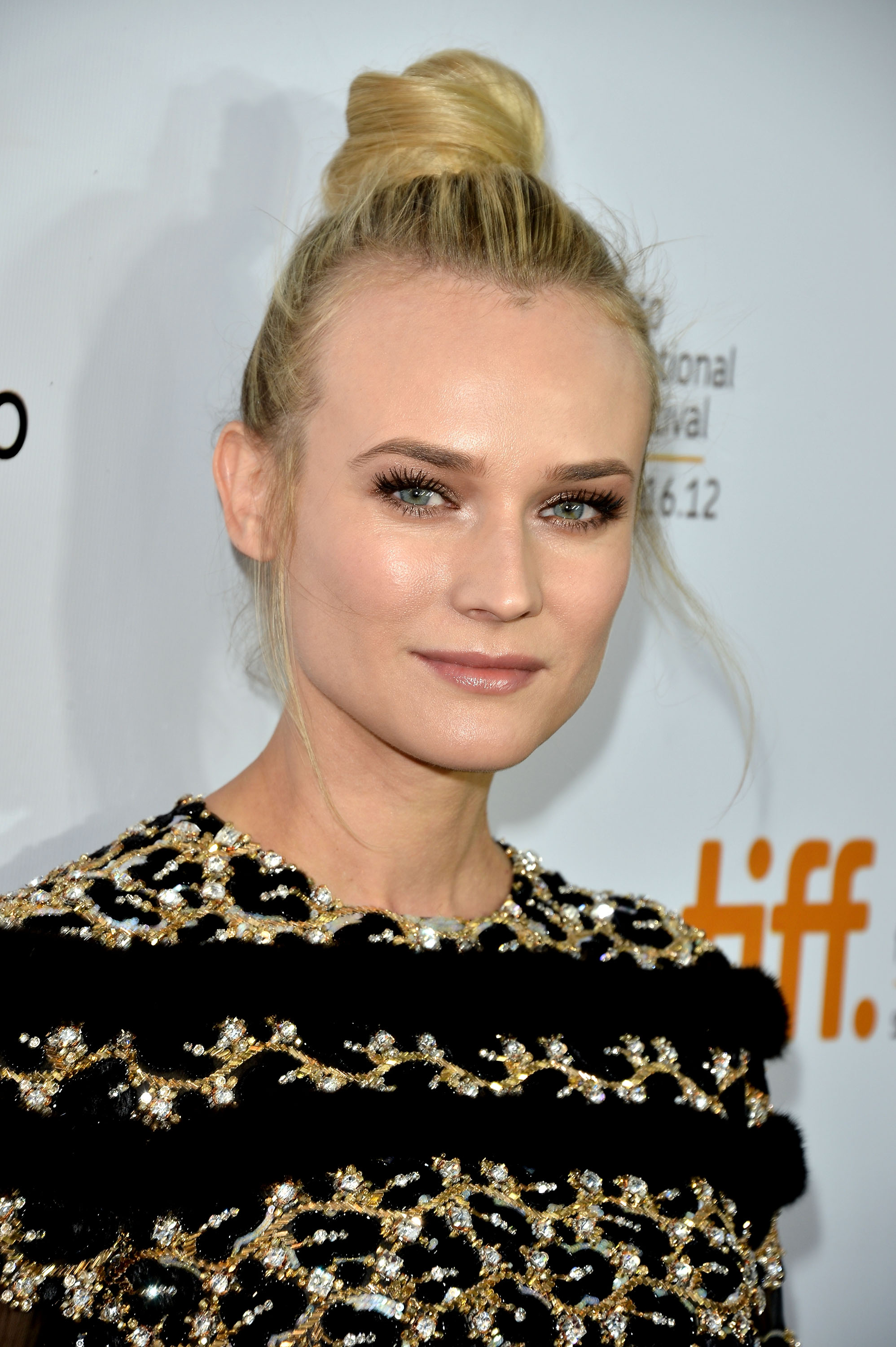 Diane Kruger wore her hair in a bun on the top of her head for the ...