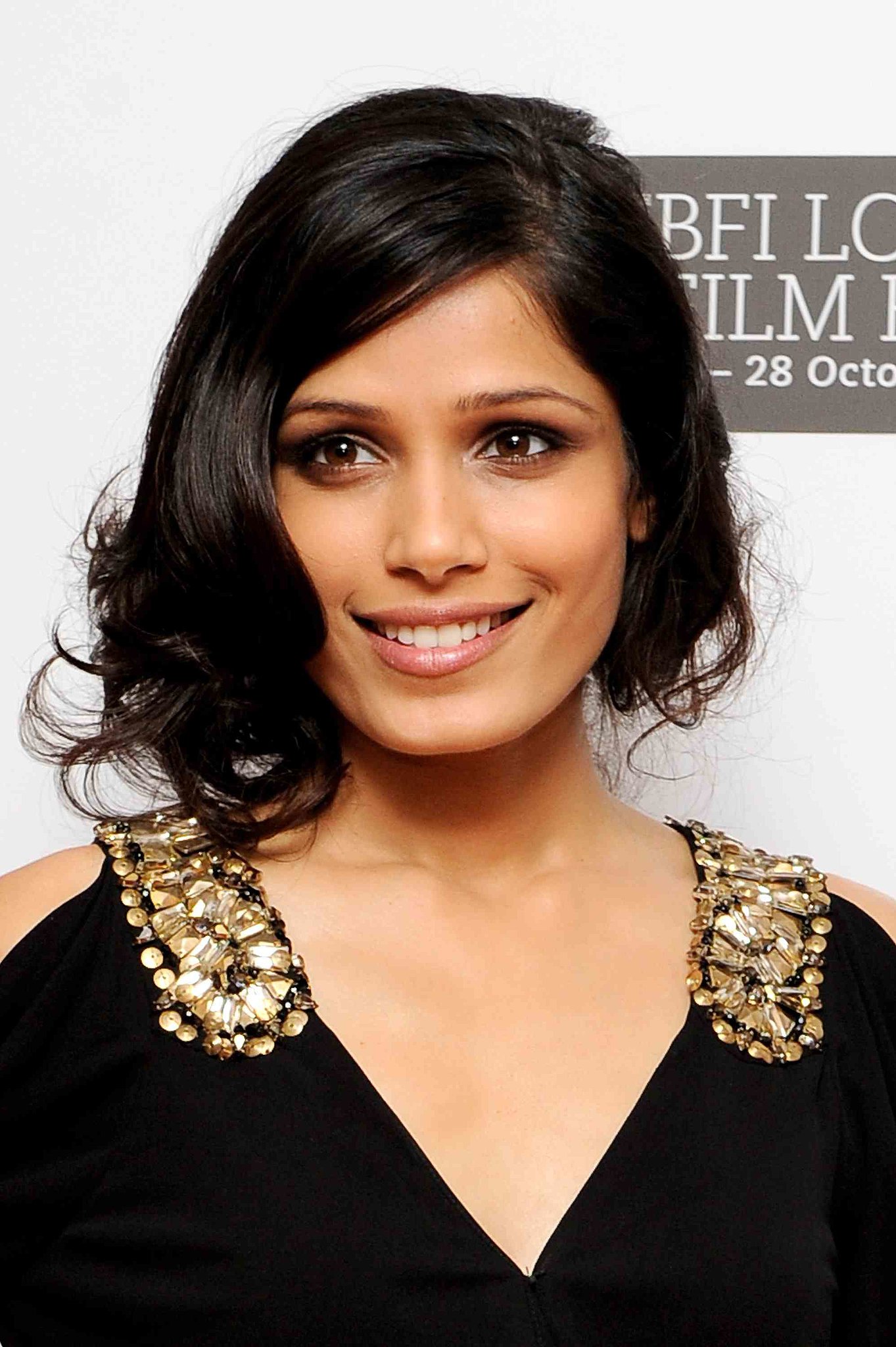 In 2010, Freida tried on short hair for a short while, wearing a faux ...