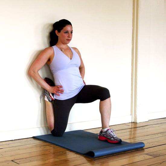 Stretch It Kneeling Quad Stretch Against A Wall Popsugar Fitness