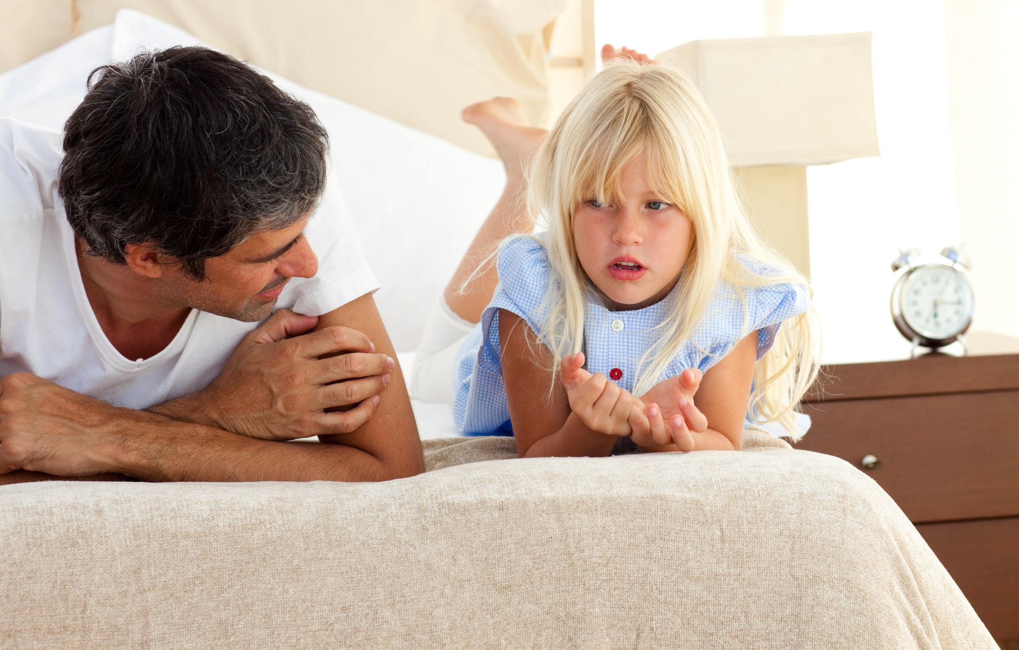 divorced parents kids sleeping in mattress