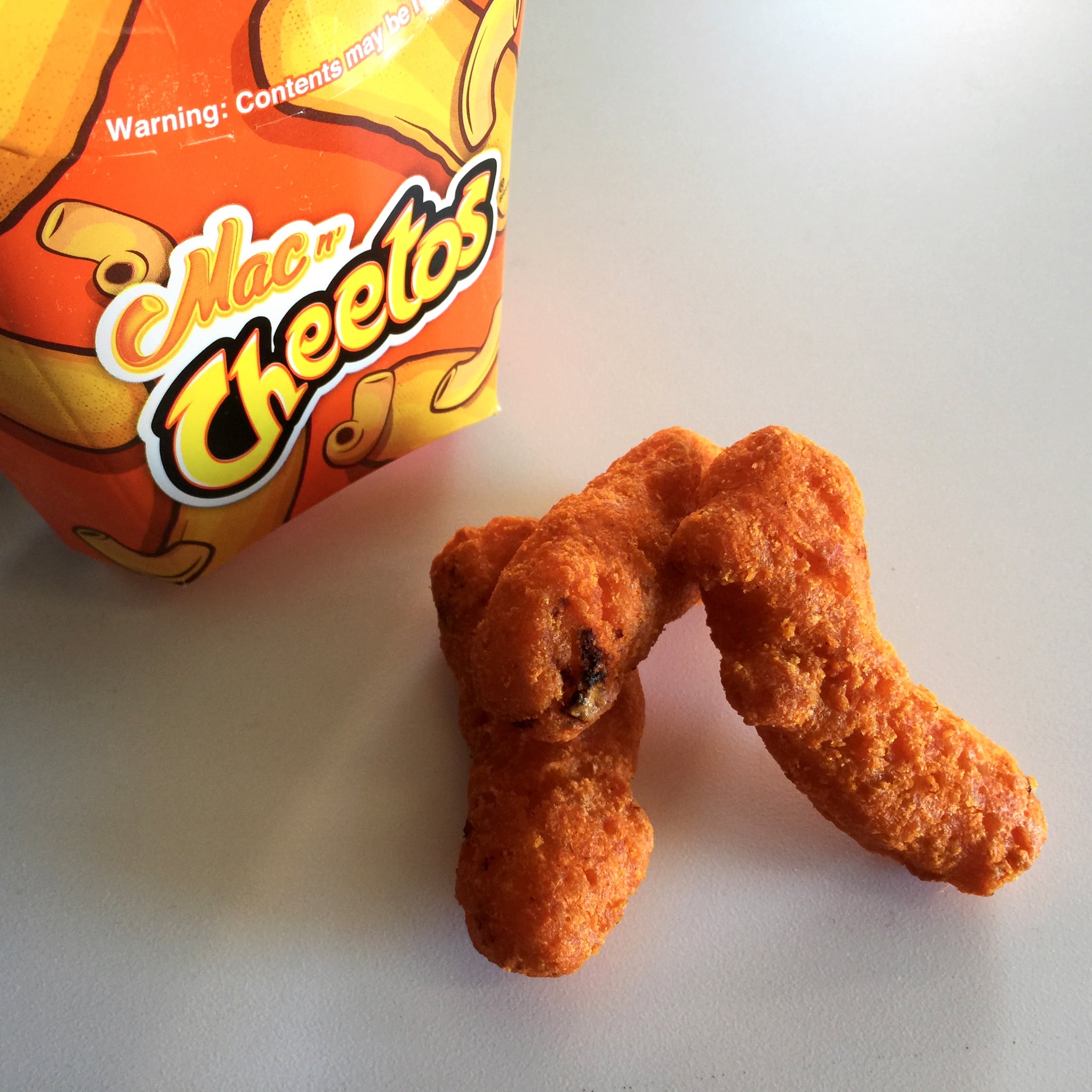 In promo shots, the Mac n' Cheetos look like Cheetos Puffs, but in rea...
