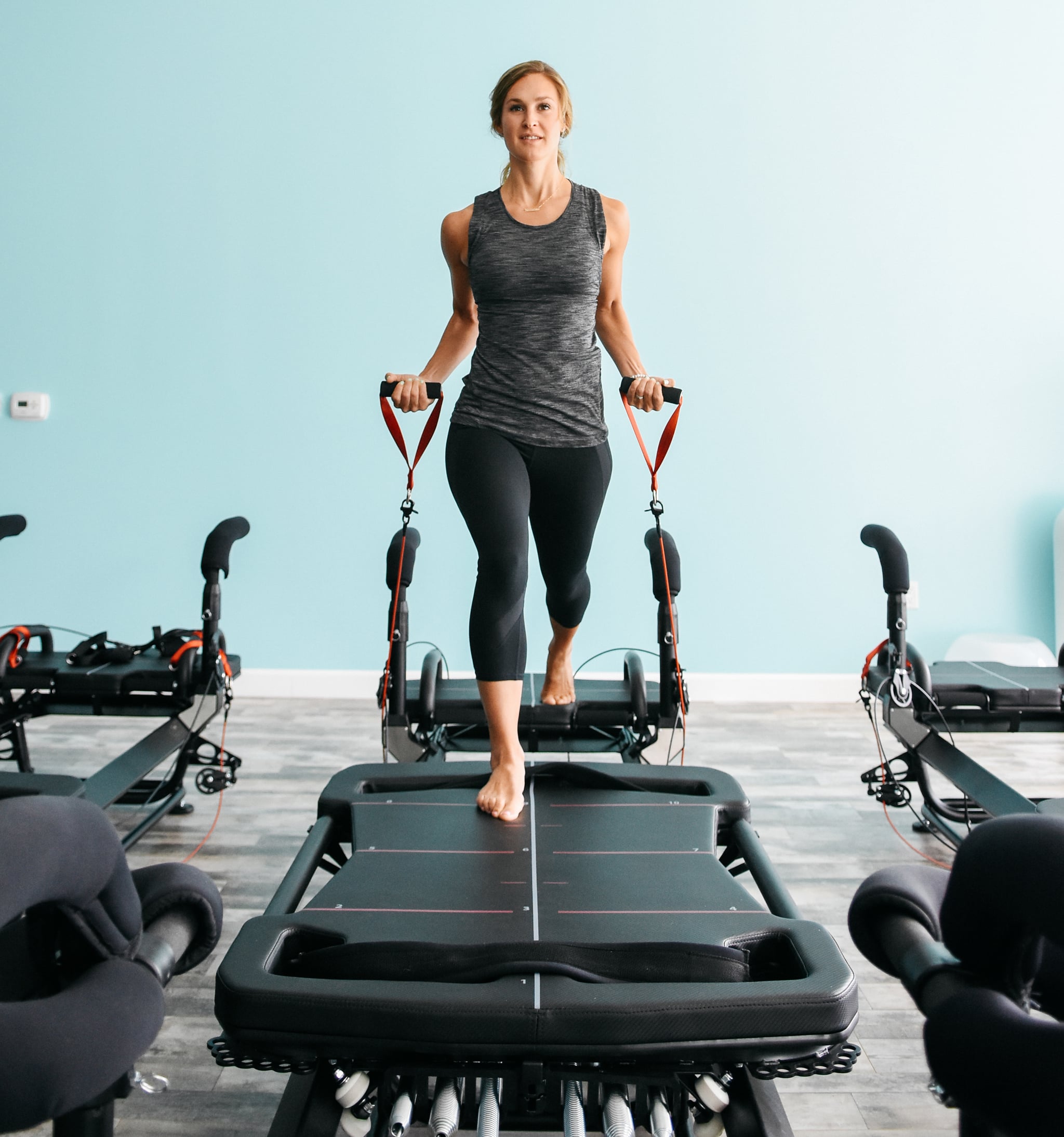 Women in the Gym Using the Exercise Equipment · Free Stock Photo